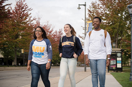 Photo of students walking on campus. Link to Closely Held Business Stock
