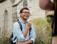 Photo of a student laughing. Link to Tangible Personal Property